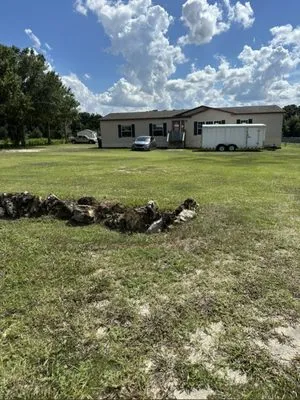 Fast trac Lawn Cares Logo