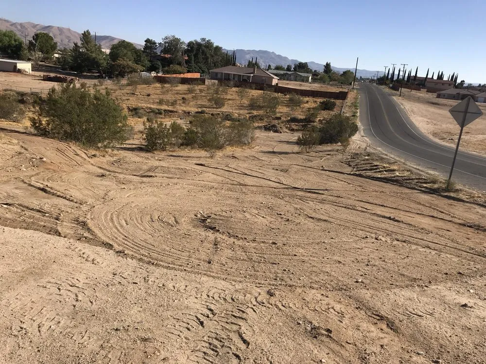 Affordable yard maintenance for beautiful yards in Hesperia, CA by Fast Trac Tractor Service