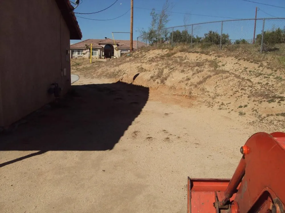 Custom yard cleanup service for residential properties in Hesperia, CA by Fast Trac Tractor Service