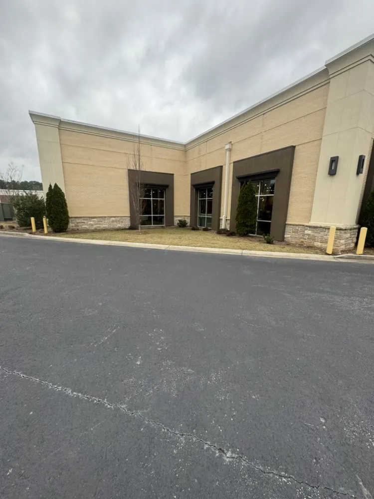 Reliable yard maintenance experts serving Tucker, GA - Father and son landscaping