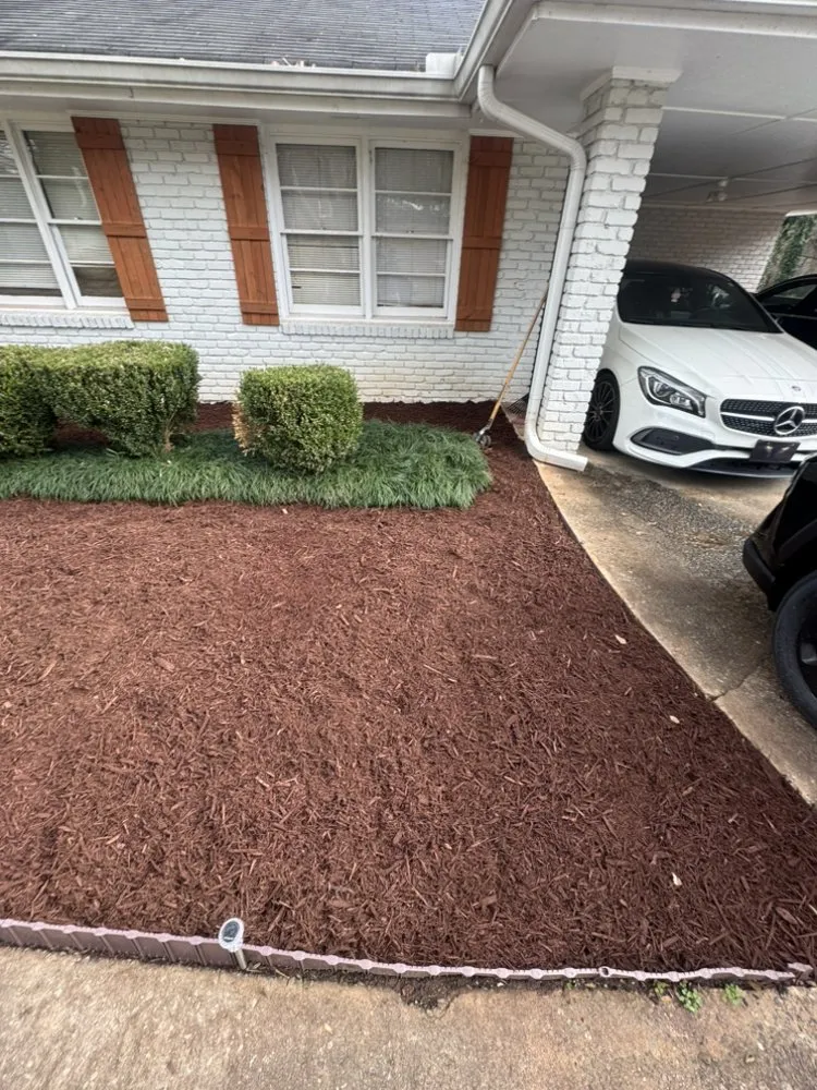 Local landscape design experts serving Tucker, GA - Father and son landscaping