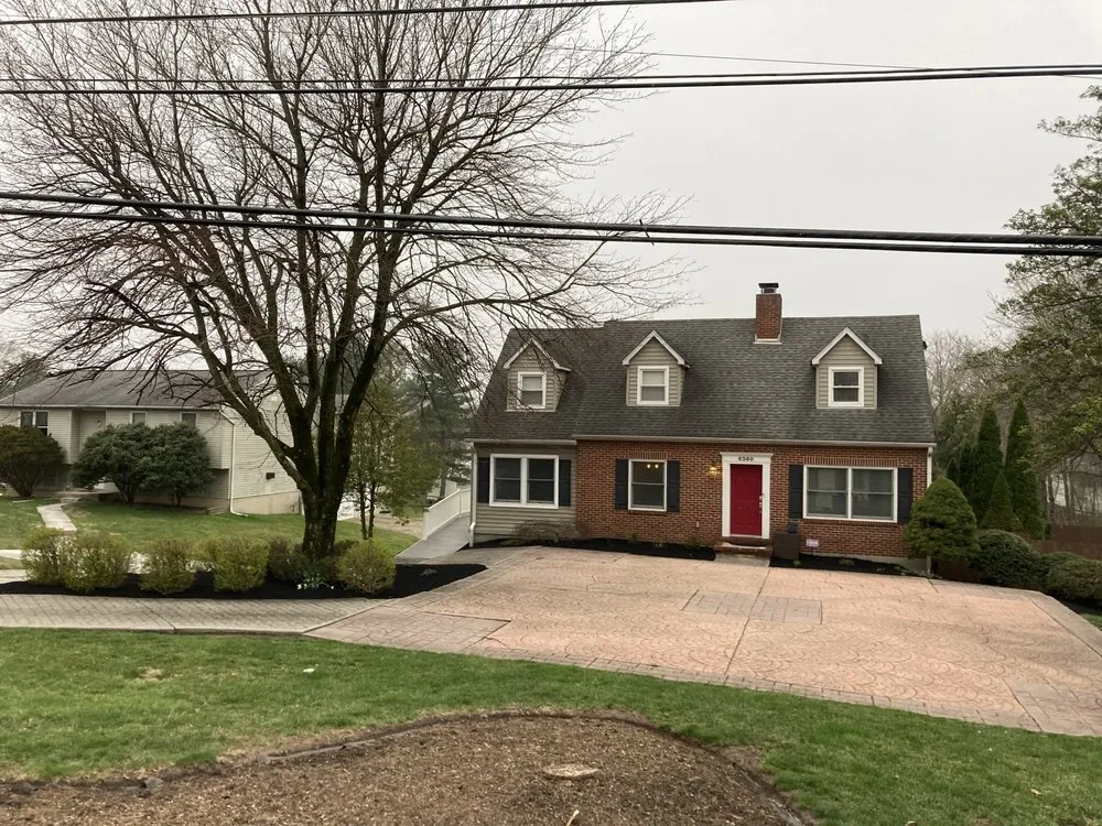 Custom landscaping services for homes in Elkridge, MD by Father and Sons Landscaping & Construction