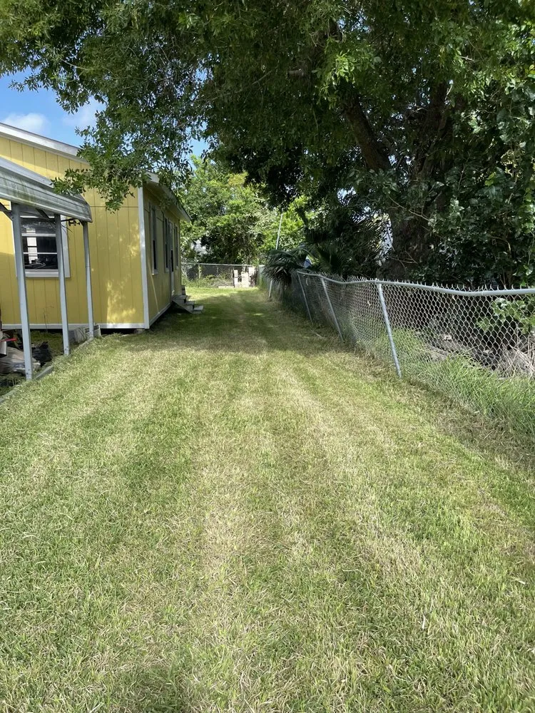 Top-rated lawn mowing service for homes in Rockport, TX by Father And Sons Lawn Service