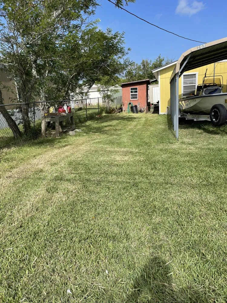 Custom yard cleanup service for outdoor upgrades in Rockport, TX by Father And Sons Lawn Service