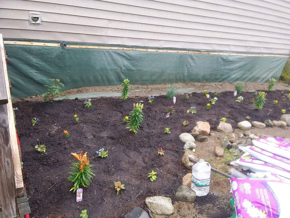 Custom landscape design in Marshfield, ME by Fayes Seasonals