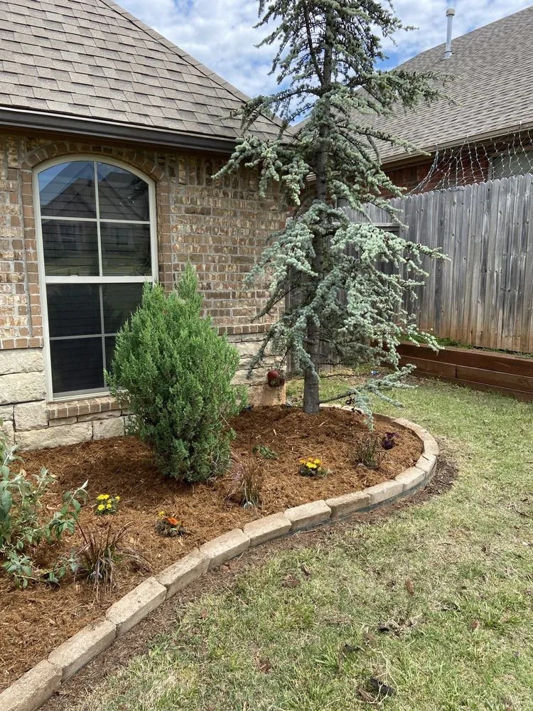Custom landscape installation in Moore, OK by Fco Great Landscaping