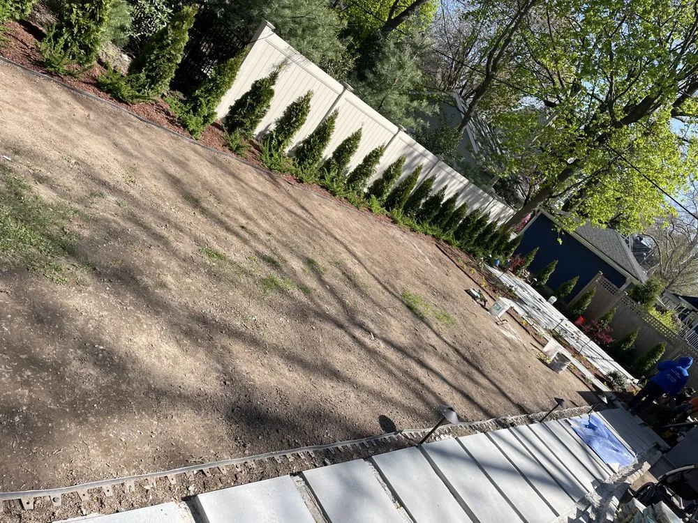 Expert lawn mowing service for year-round maintenance in Paterson, NJ by F&E Garden Maintenance