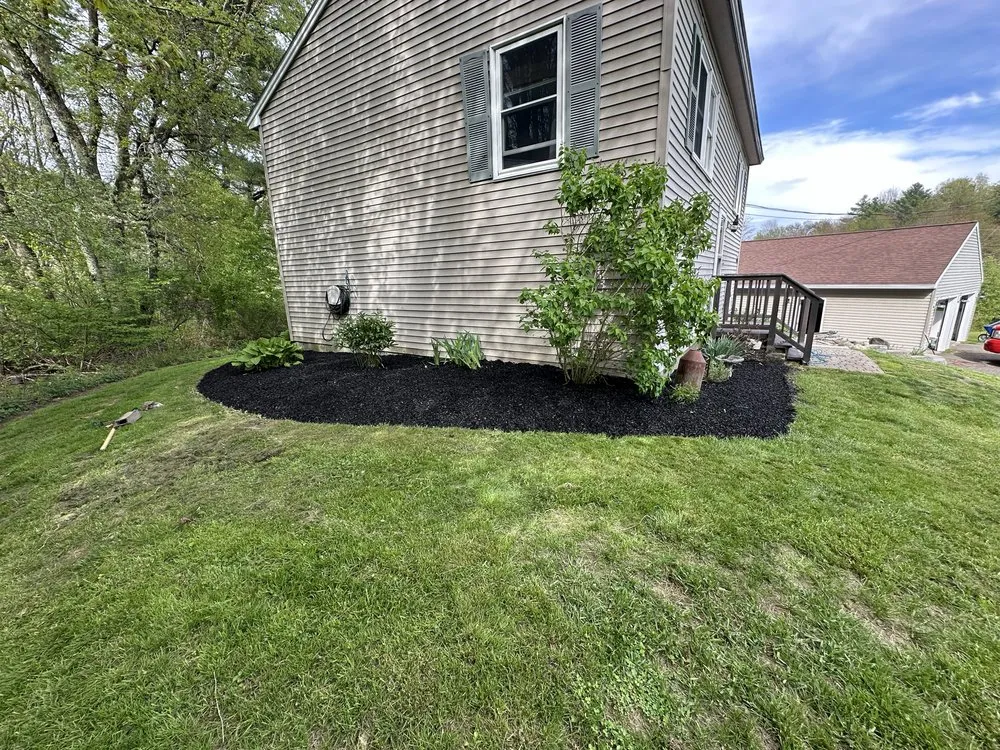 Expert lawn mowing service for year-round maintenance in Windham, ME by Fecteau’s Property Services