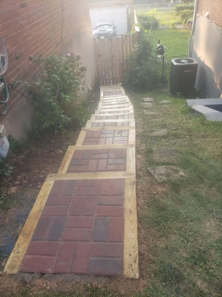 Custom landscape installation for residential properties in Silver Spring, MD by Feliciano Gonzalez