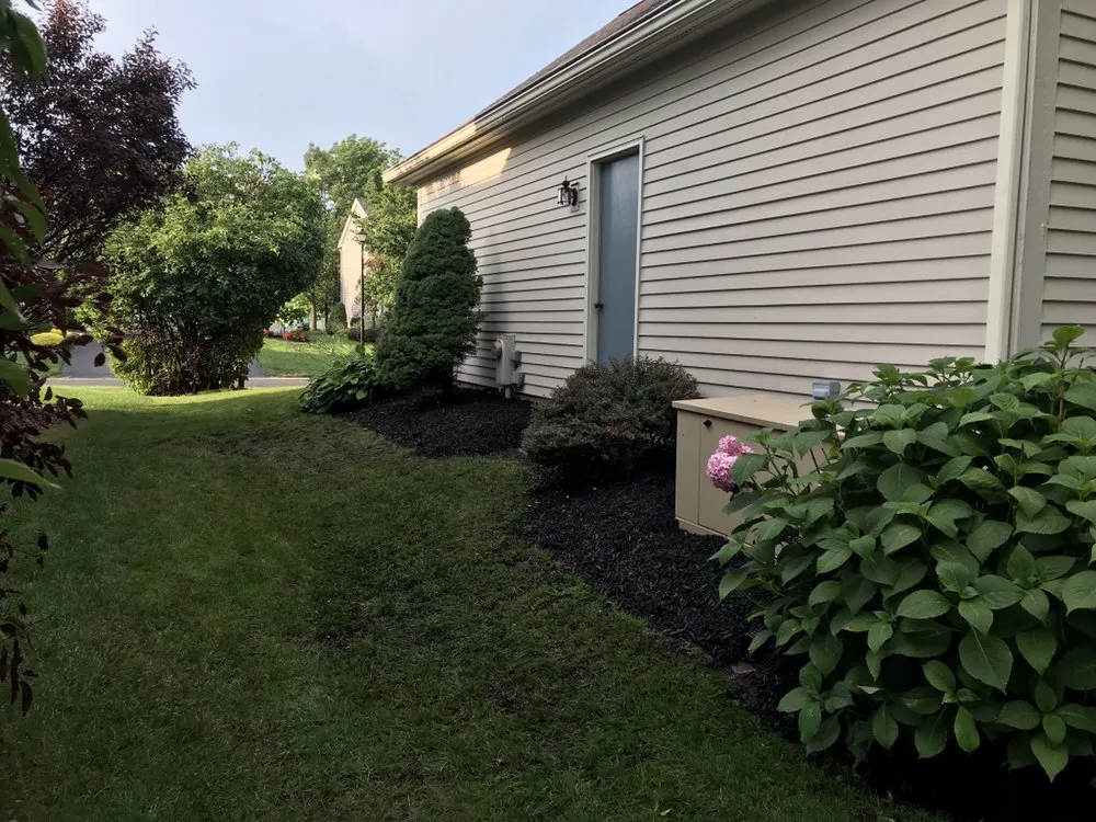 Custom landscaping services for beautiful yards in Syracuse, NY by Feliciano Landscape