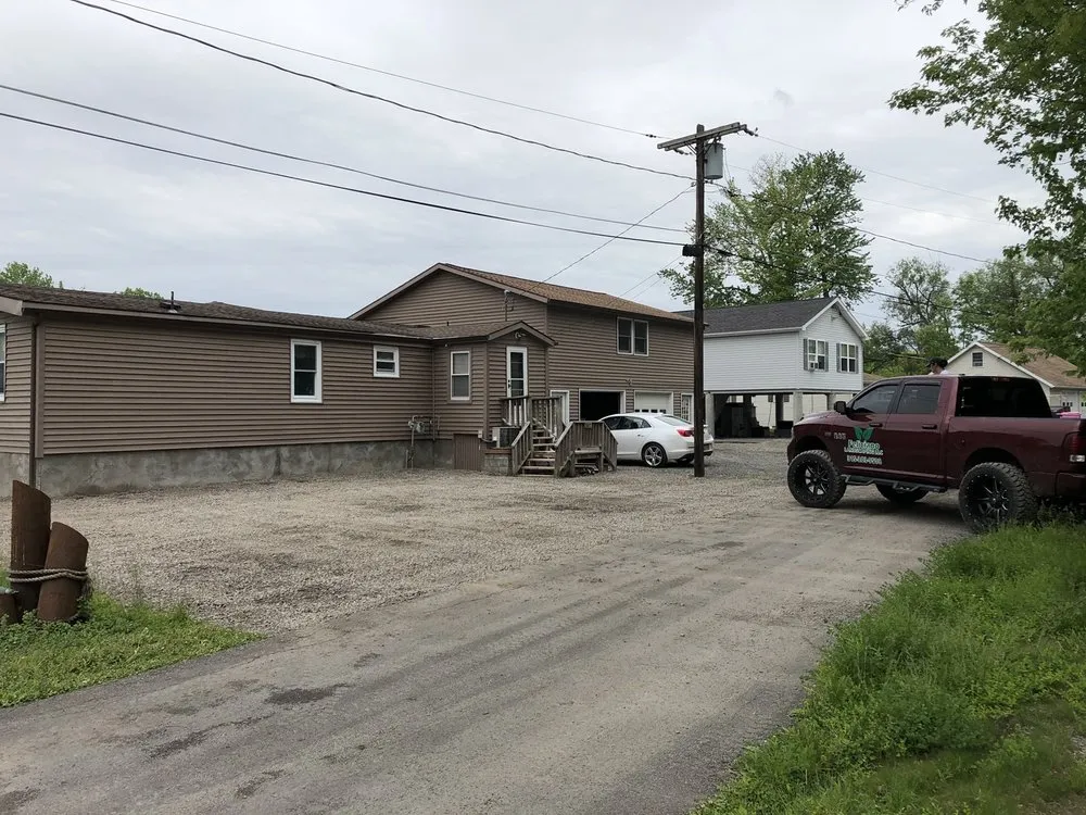 Local lawn care service for year-round maintenance in Syracuse, NY by Feliciano Landscape