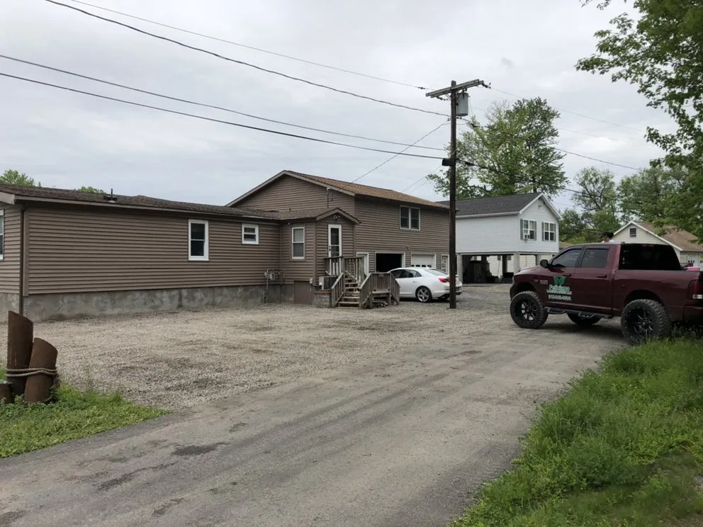 Custom landscape installation with custom design in Syracuse, NY by Feliciano Landscape