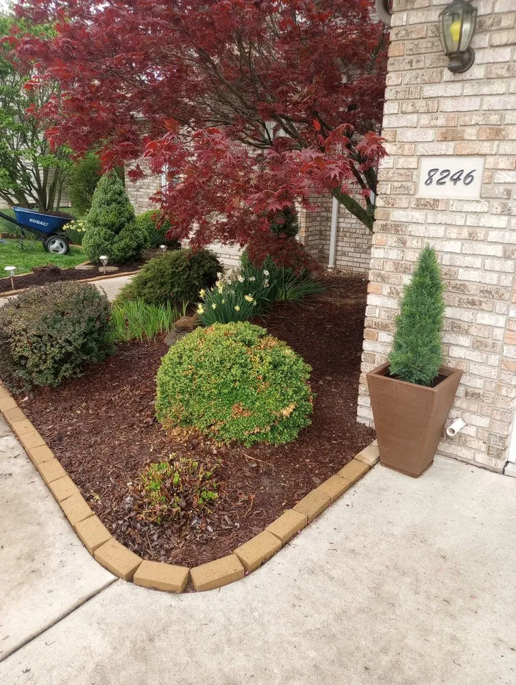 Custom lawn mowing service for year-round maintenance in Tiffin, OH by Fence And Moore