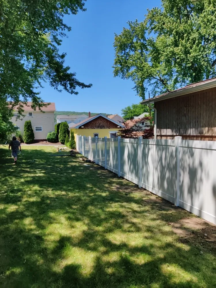 Custom landscape design for residential properties across Scranton, PA - Fence to a T