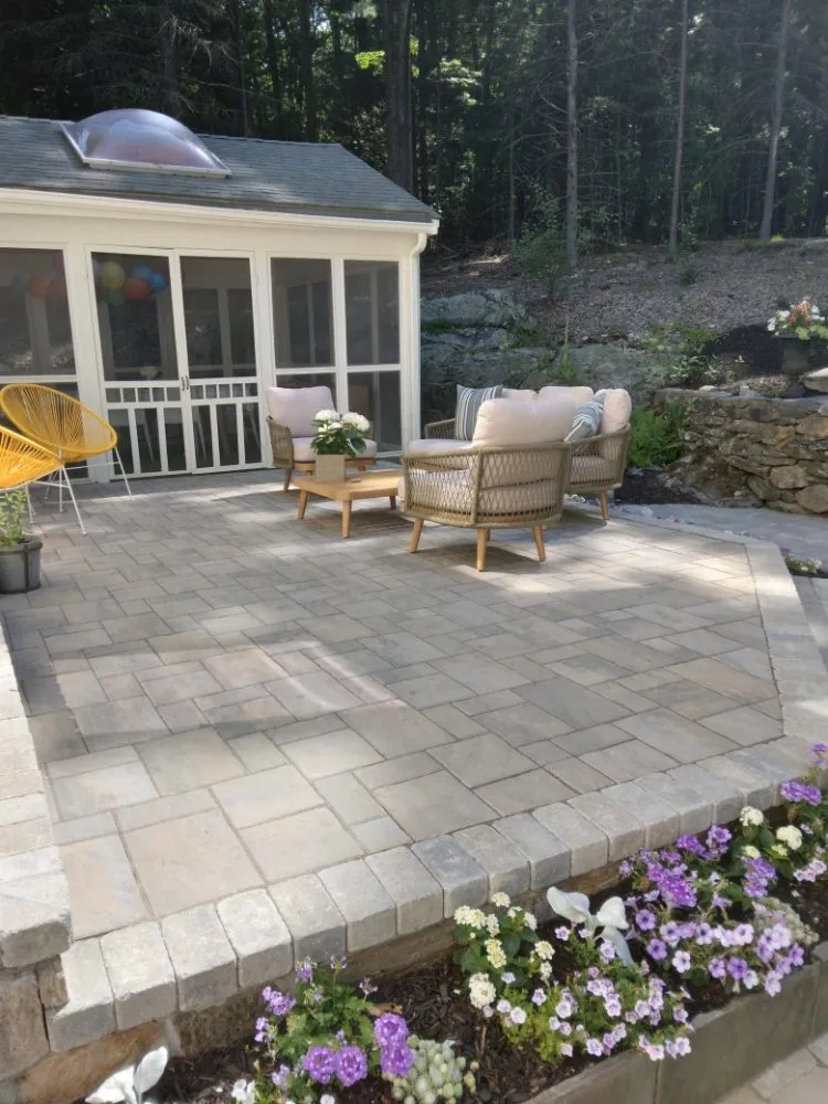 Local yard maintenance for year-round maintenance in Waltham, MA by Fernandez Landscaping