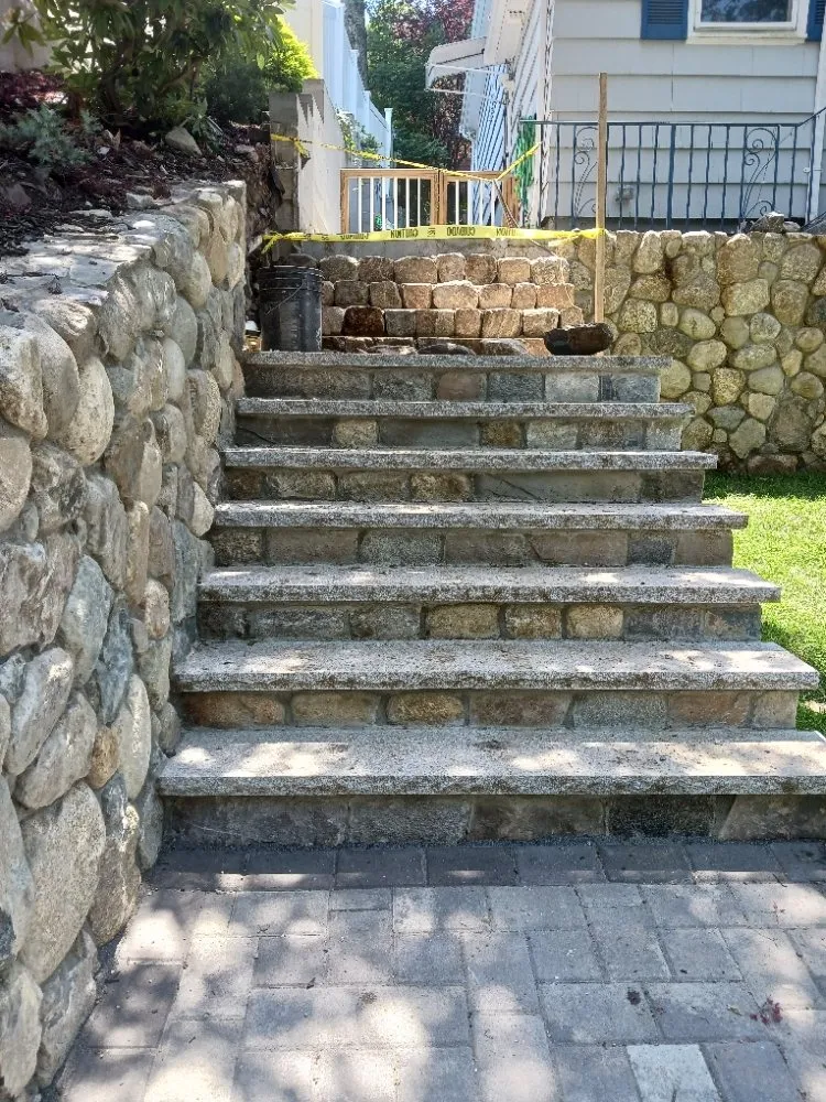 Custom lawn care service for year-round maintenance in Waltham, MA by Fernandez Landscaping