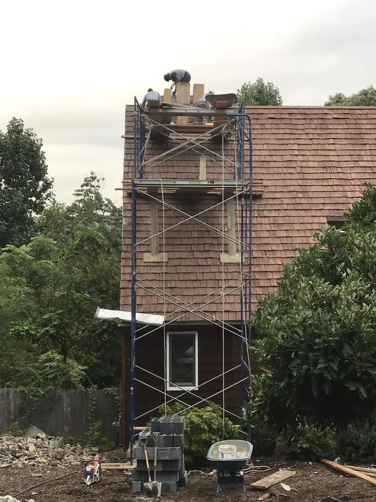 Professional yard cleanup service with custom design across Morris Plains, NJ - Fernandez Masonry Landscaping