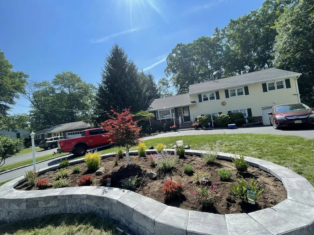 Custom lawn care service with custom design across Morris Plains, NJ - Fernandez Masonry Landscaping