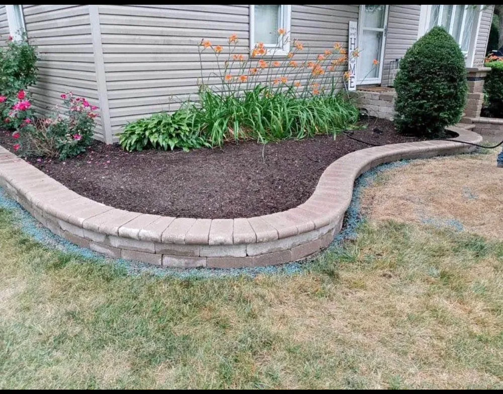 Professional yard maintenance for homes in Joliet, IL by Fernando Landscaping