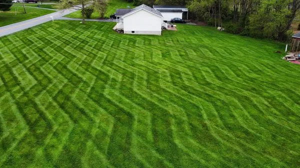 Fickner Lawn and Landscaping Logo