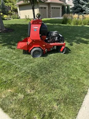 Field Of Green Lawncare Logo