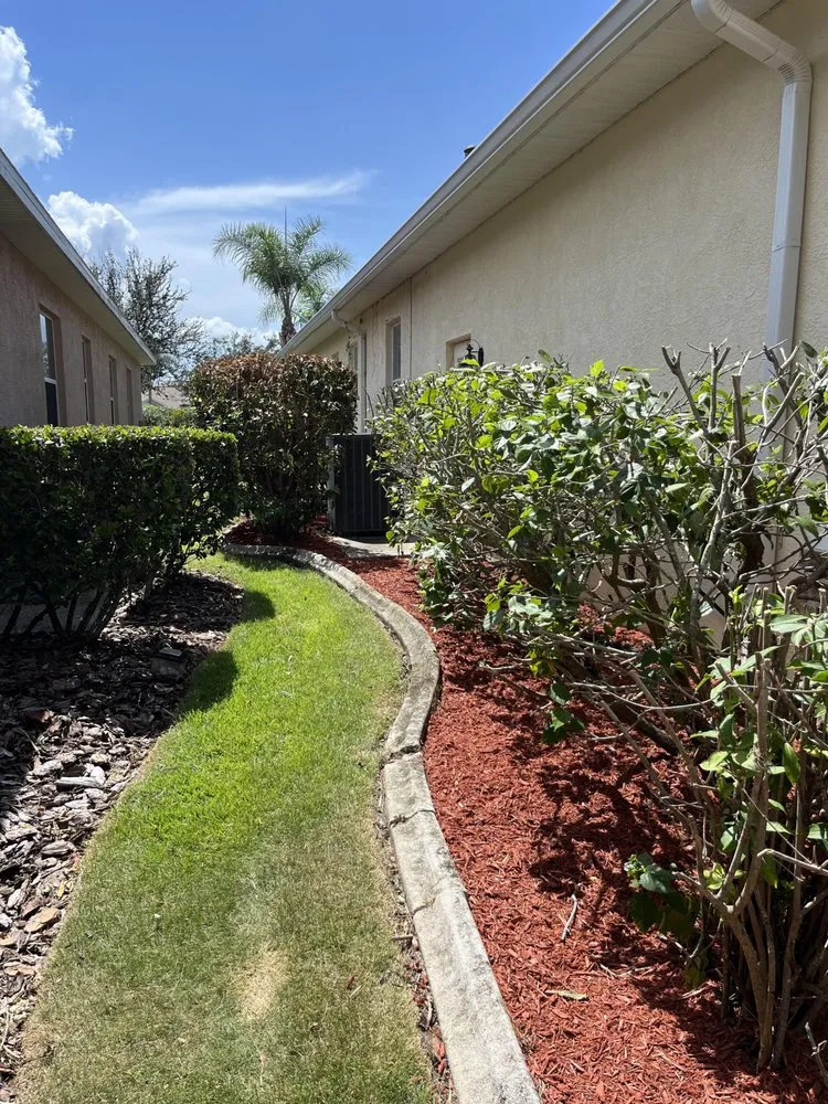 Professional lawn mowing service for outdoor upgrades in Bradenton, FL by Fields of Gold Landscaping