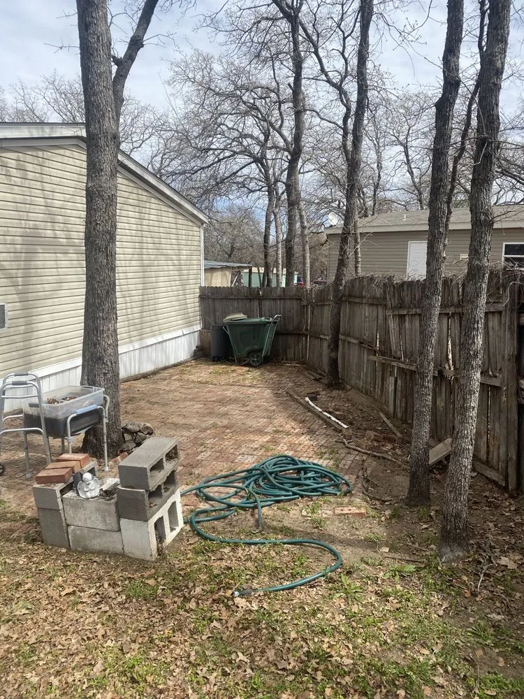 Affordable yard cleanup service in Azle, TX by Fincher Construction and Landscaping