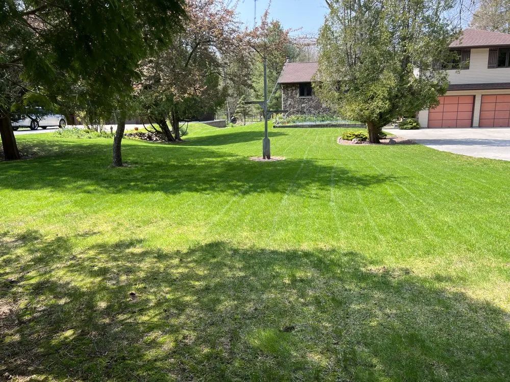 Expert landscape design for outdoor upgrades in Manitowoc, WI by Finck Lawn and Landscape