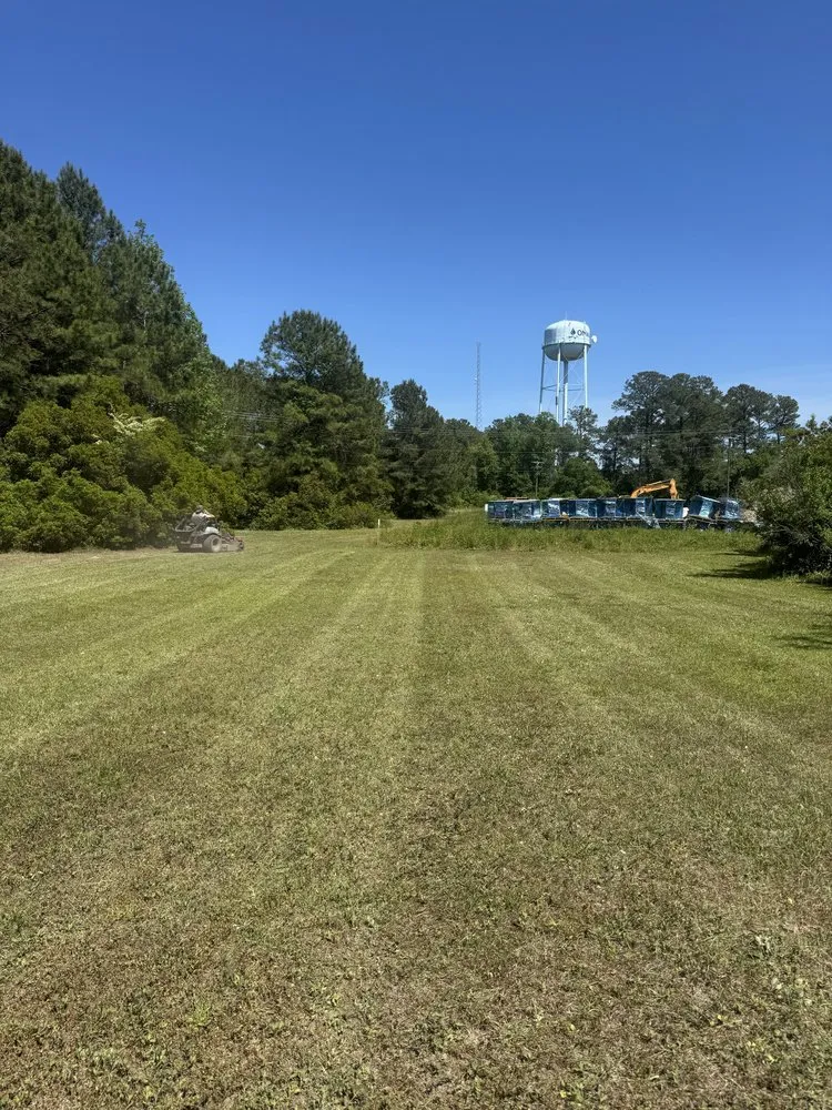 Custom lawn mowing service for homes in Jacksonville, NC by Fine Line Landscaping