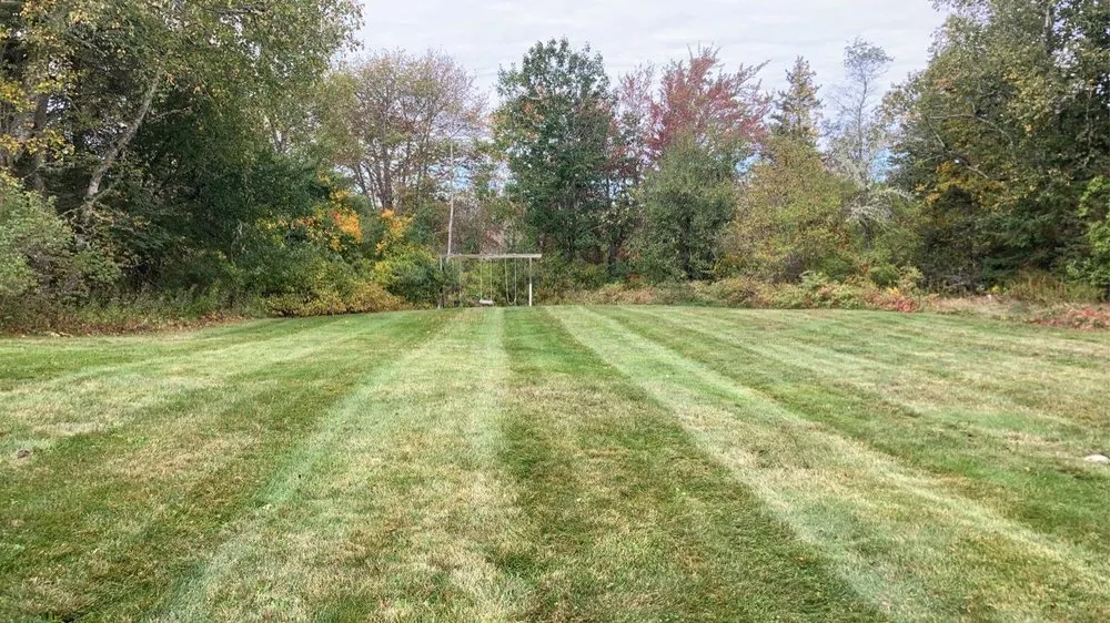 Custom outdoor landscaping in Milo, ME by Fine Line Lawn Care