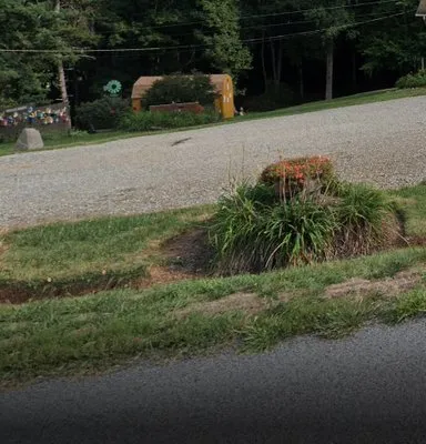 Finishing Touches Lawn Care Logo