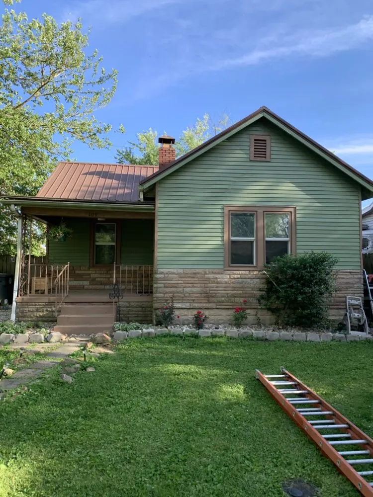 Custom lawn mowing service for residential properties in Oakland City, IN by Finishing Touches