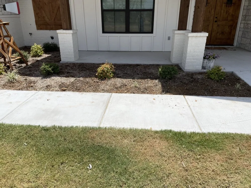 Custom landscape design in Godley, TX by Finn's Lawn Care Services
