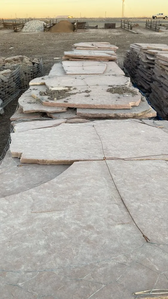 Custom landscape installation for homes across Wolfforth, TX - Fire and Ice Firewood