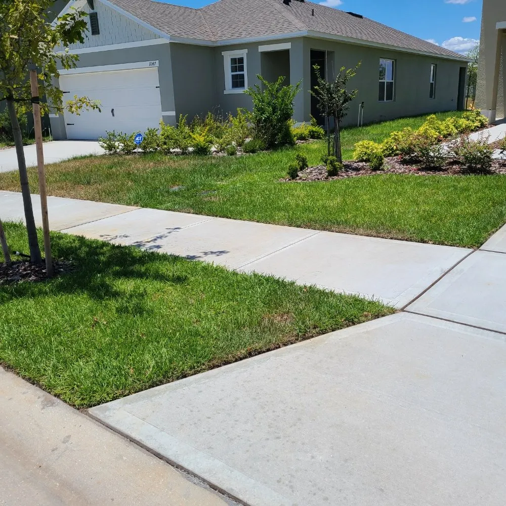 Custom landscape design for beautiful yards in Davenport, FL by Fire Blades of Florida