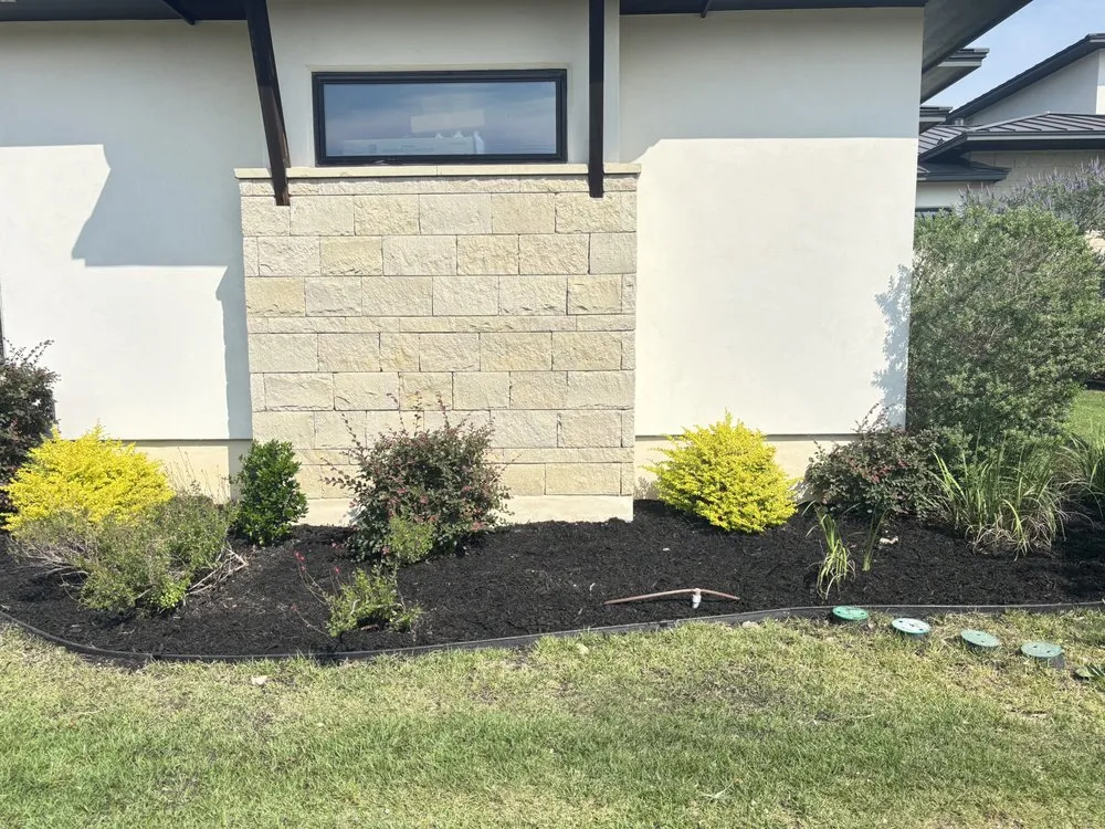 Professional landscape installation in Helotes, TX by Firm Foundation Landscaping
