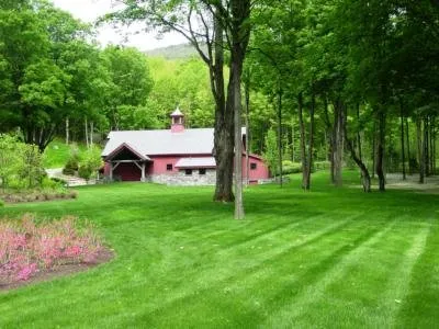 Custom landscape design in Weare, NH by Firmly Rooted Landscaping
