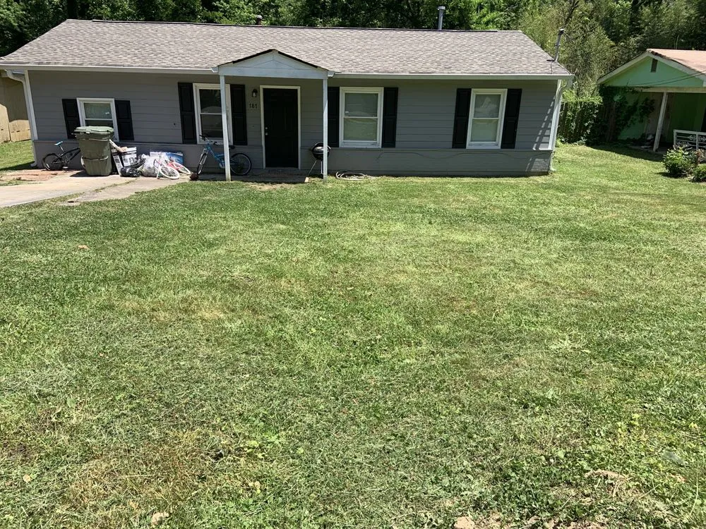 Custom lawn mowing service for homes in Decatur, GA by First & Goal