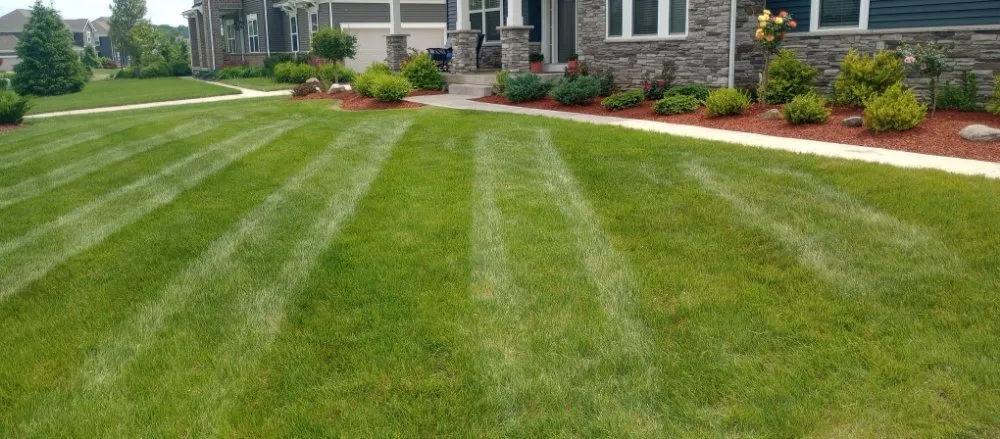 Professional lawn mowing service for homes across Tallmadge, OH - First Choice Landscaping And Lawn Maintenance