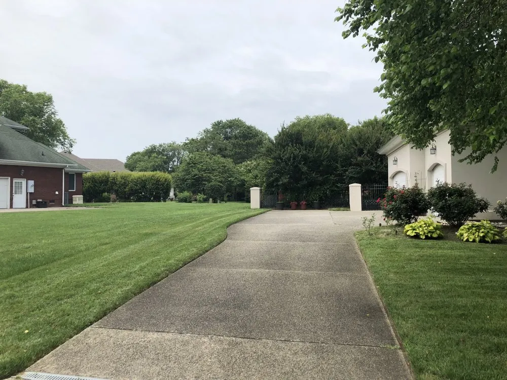 Custom landscape design for residential properties in Hampton, VA by First Class Cuts