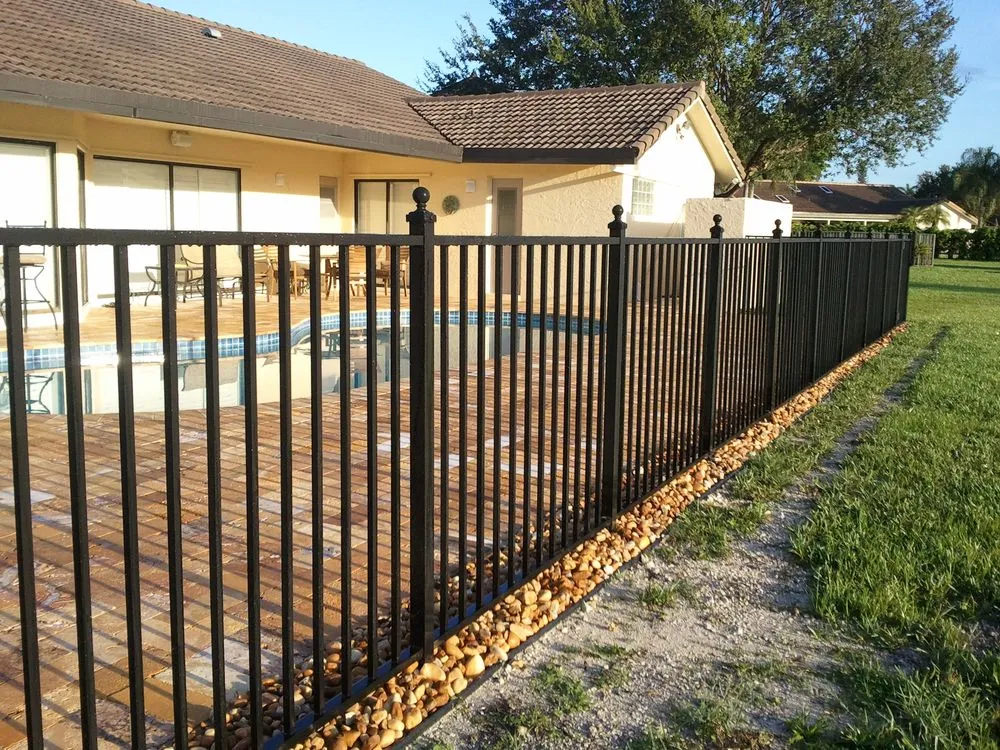 Local yard cleanup service for outdoor upgrades in Sunrise, FL by First Class Fence & Rail