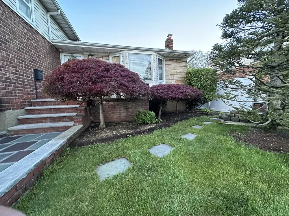 Professional landscaping services for residential properties across Uniondale, NY - First Class Landscaping