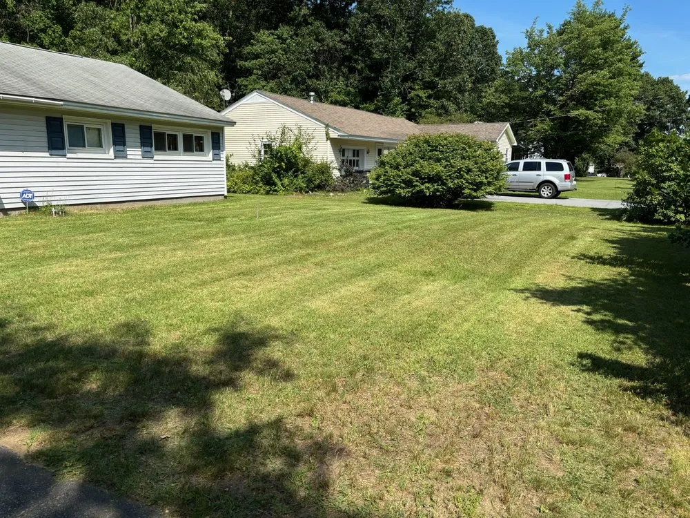 Local lawn care service in Hudson Falls, NY by First Class Lawn Care
