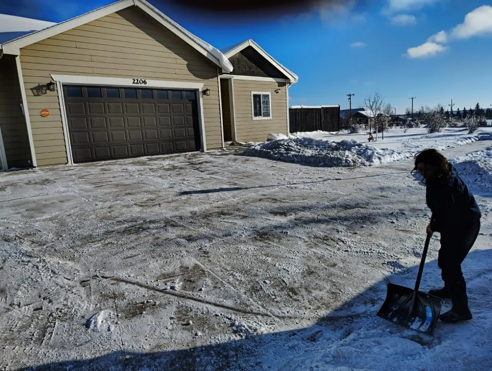 Affordable lawn mowing service for homes in Williston, ND by First Impression Services