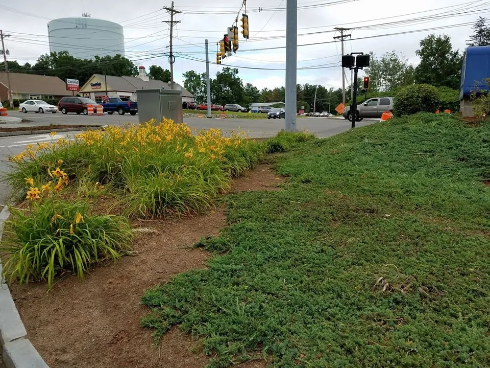Custom landscape design for year-round maintenance in Lowell, MA by First Impressions Landscaping
