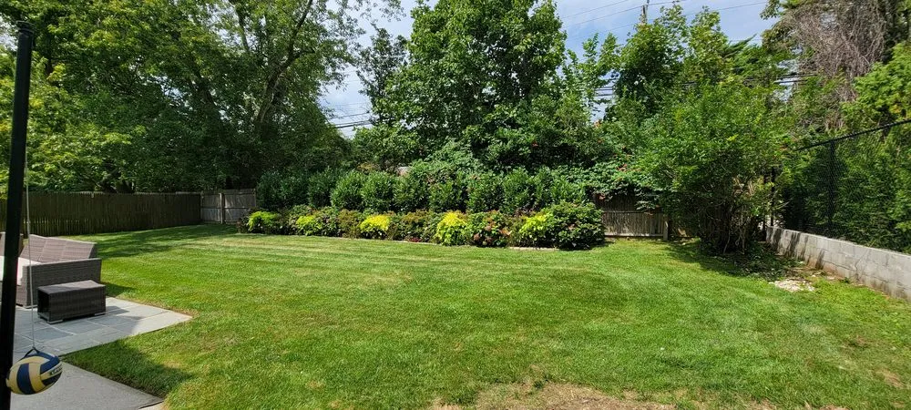 Top-rated lawn mowing service with custom design in Woodmere, NY by First in class landscape
