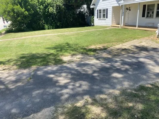 Fish and Loaves Lawn Management Logo