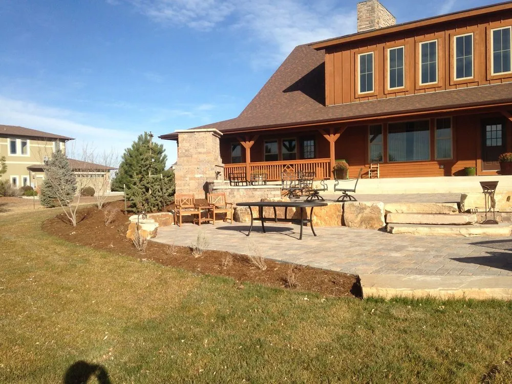 Custom lawn mowing service for homes across Greeley, CO - Fisher Landscaping