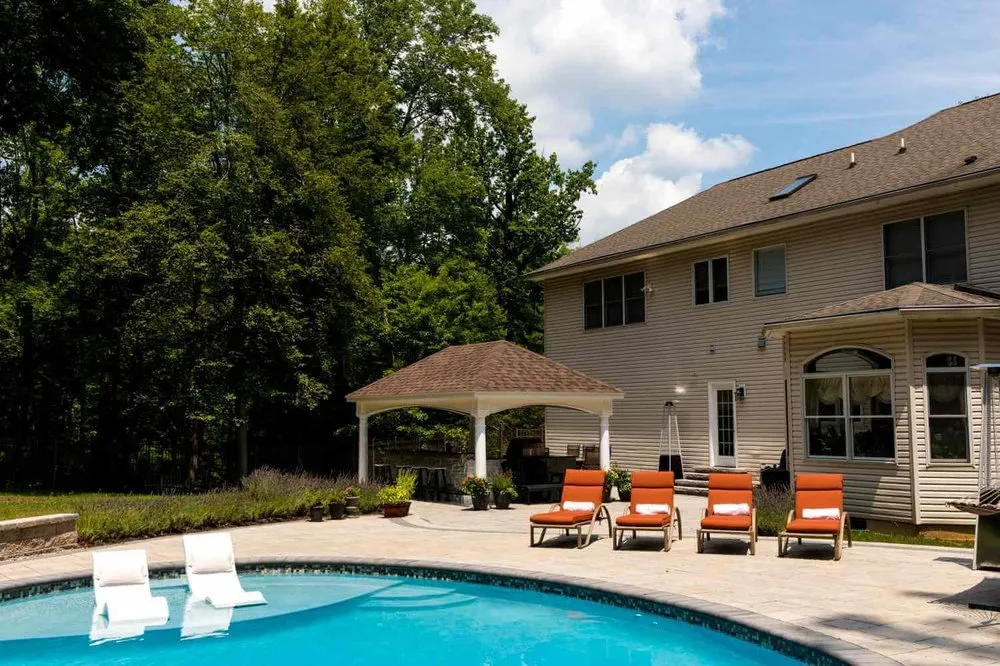 Local yard cleanup service for residential properties in Green Brook, NJ by Fitz's Fish Ponds