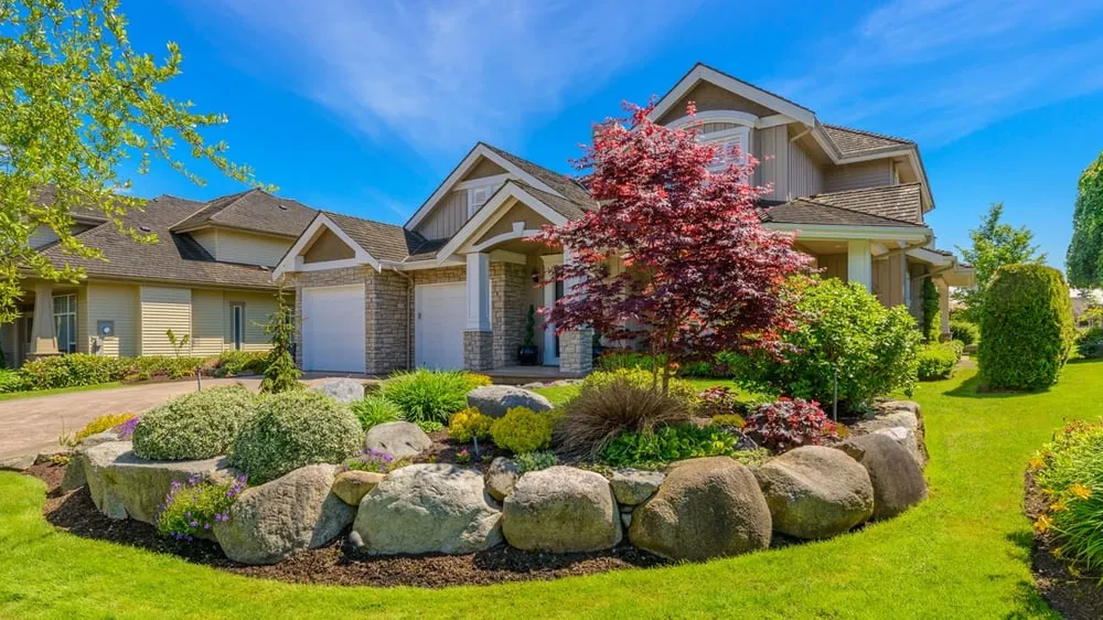 Custom landscape installation with custom design in Kokomo, IN by Five Star Lawn Care & Landscaping